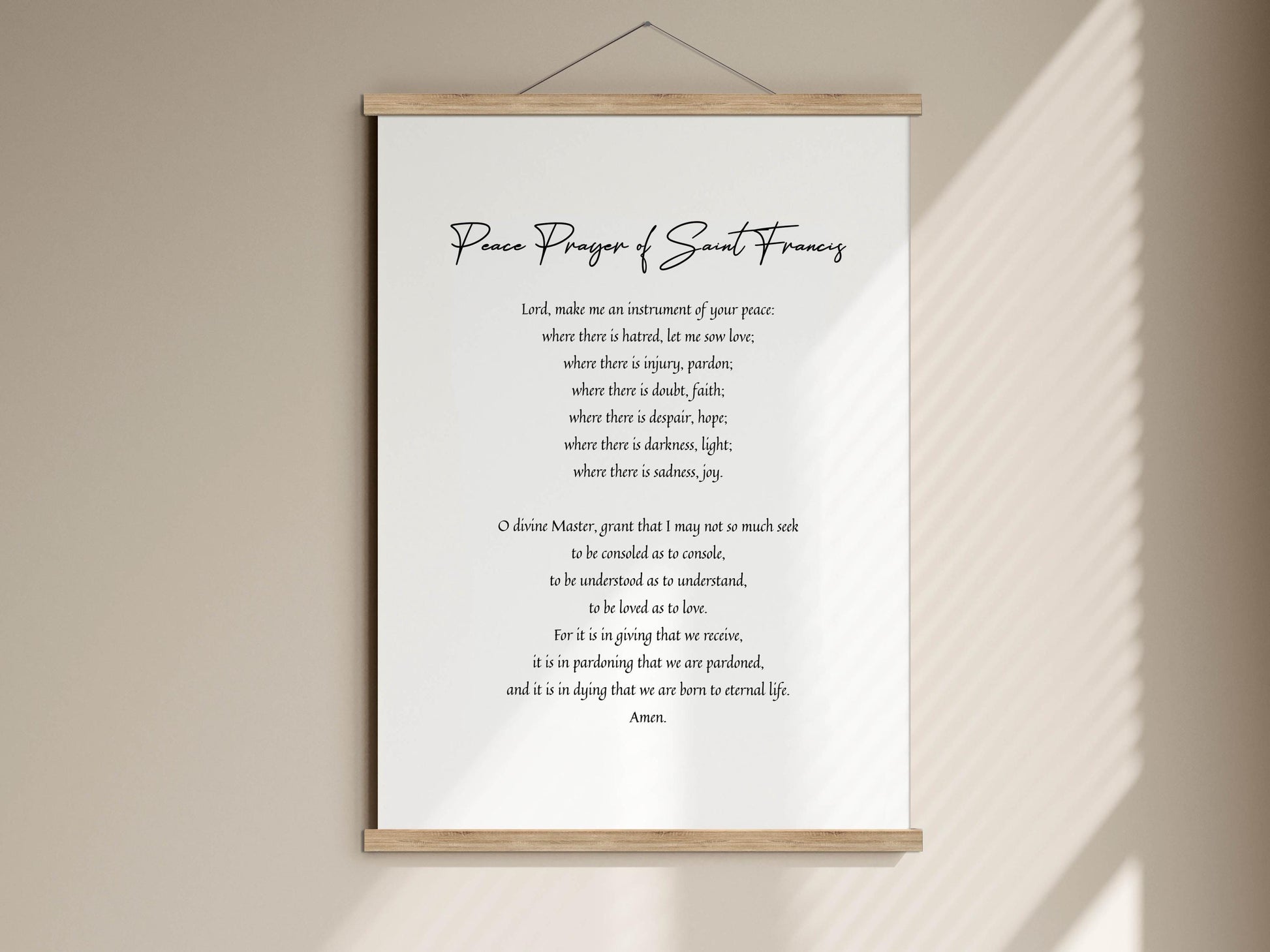 a poster with a prayer written on it, hanging on a wall.