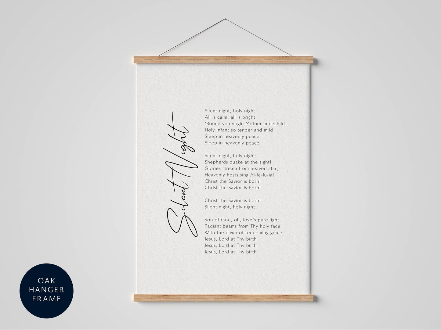 The image is a poster with a list of Christmas-related phrases and a list of Christmas-related phrases. The poster is hanging on a wall and has a wooden frame.