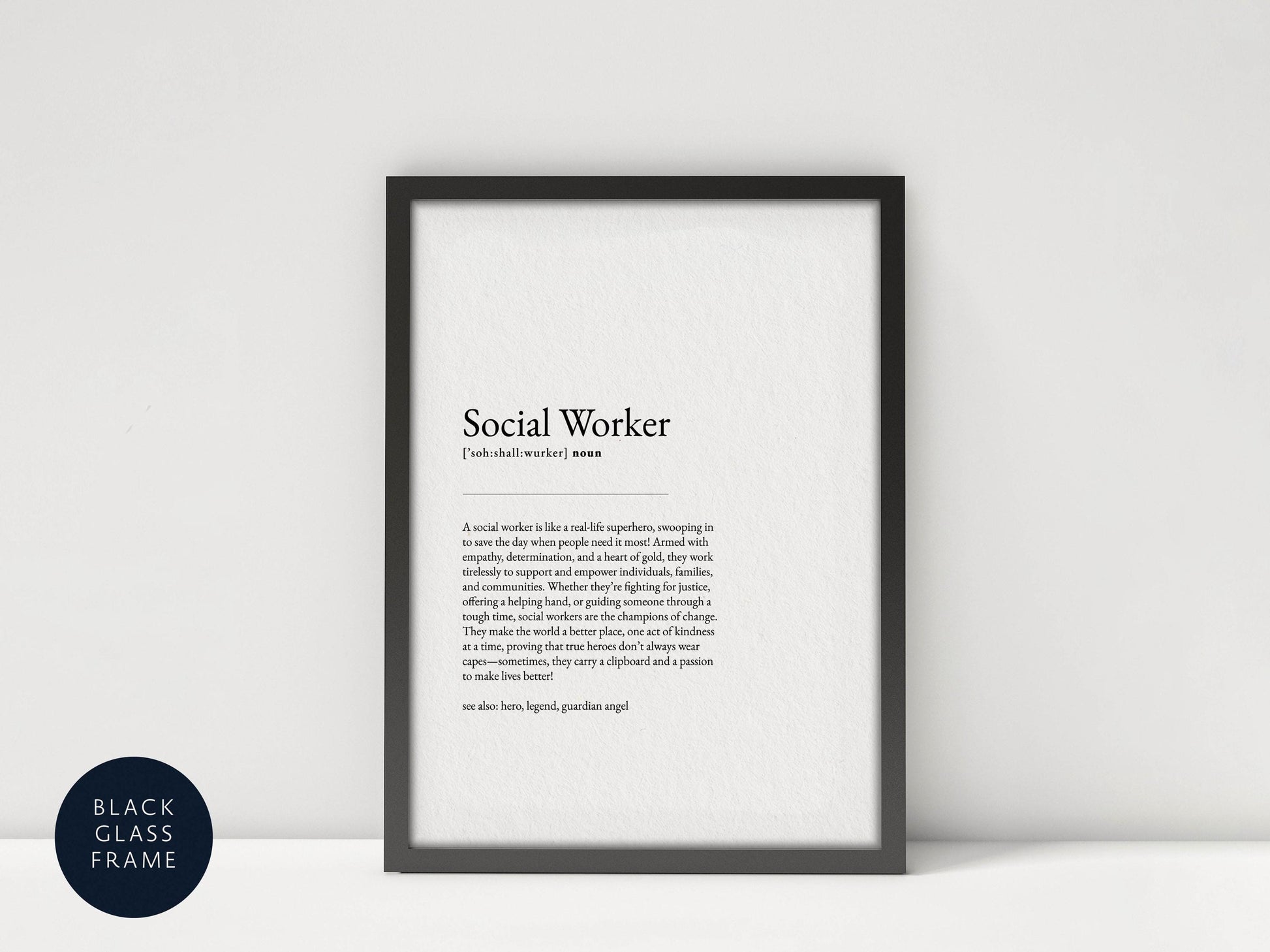 a black framed print with a definition of a social worker, which is a real-life superhero, swooping in to save the day when people need help.