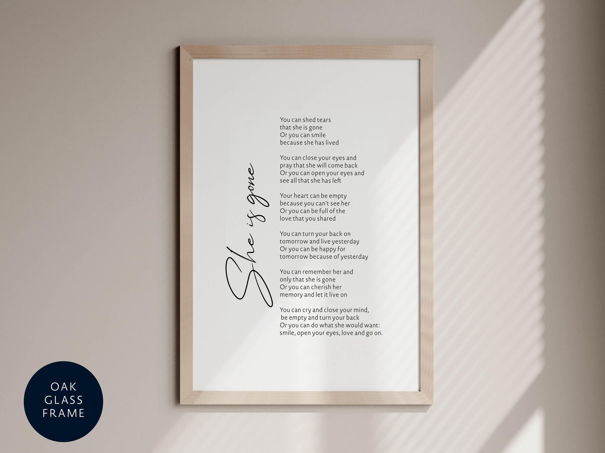a framed poem titled &quot;She&#39;s gone&quot; with a black and white color scheme.