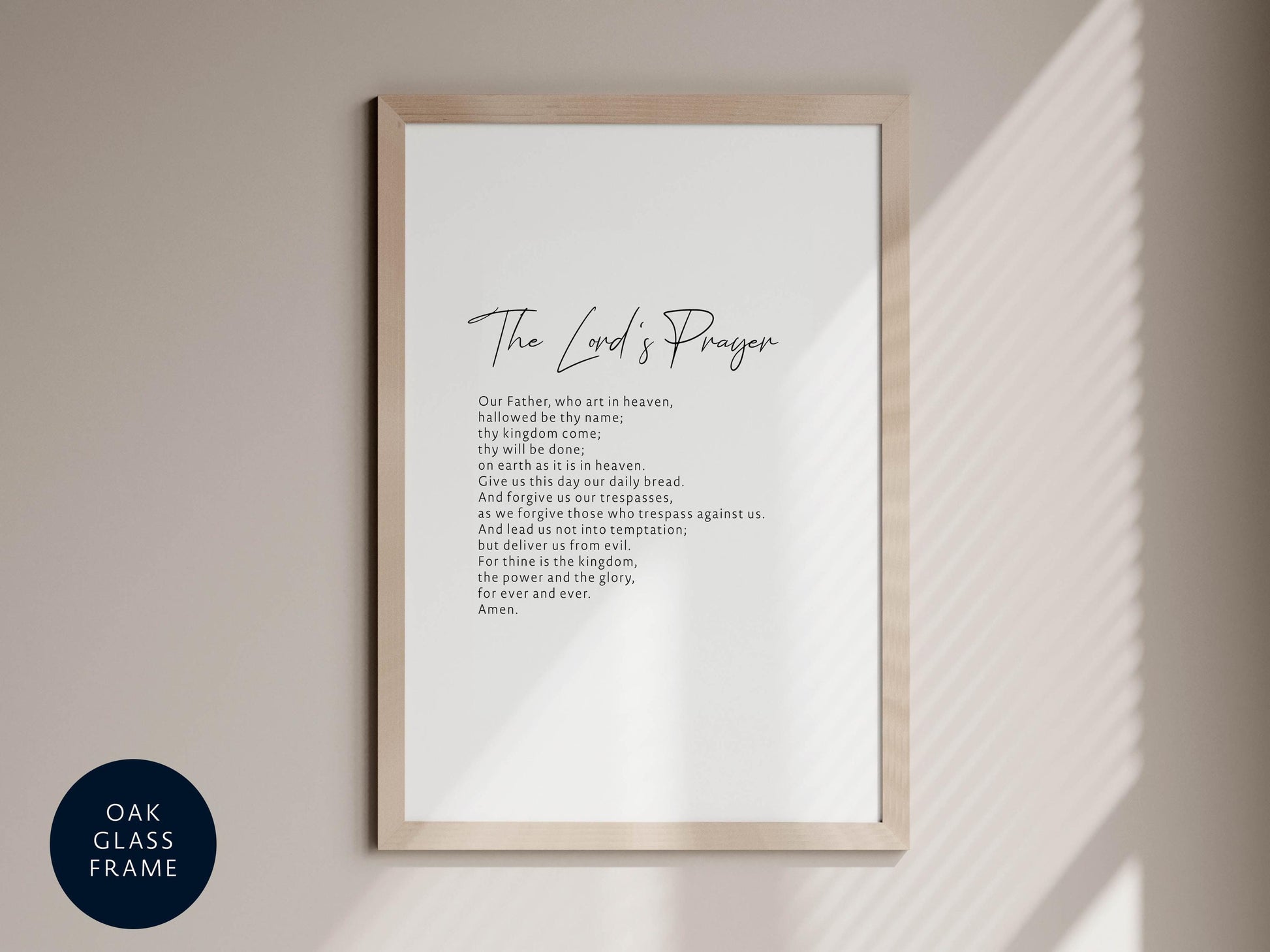 a framed print of a religious prayer with a black and white color scheme.
