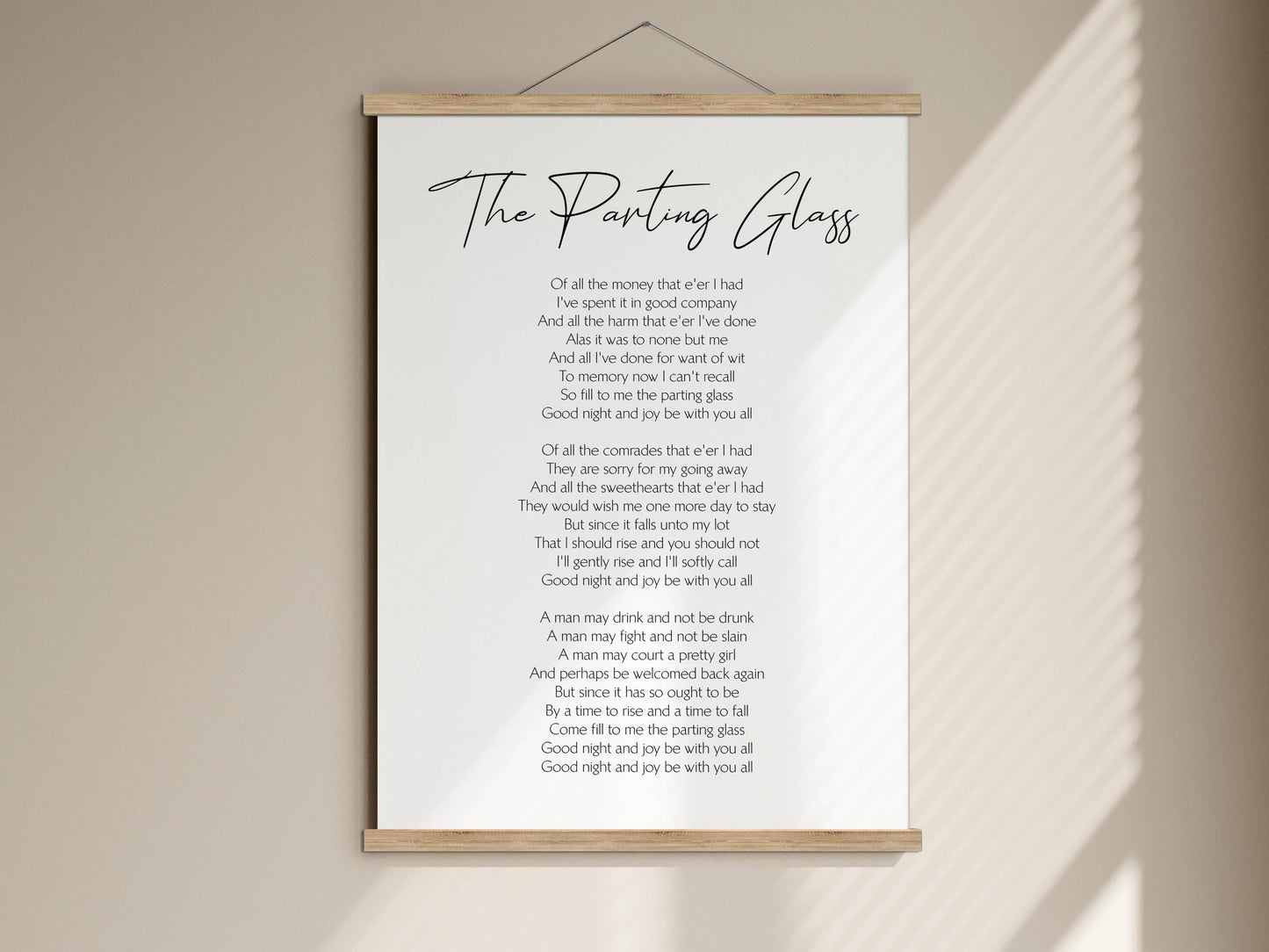 a poem titled &quot;The Parting Glass&quot; with a white background and black text. The poem is written in a cursive font and includes a list of lines that describe the speaker&#39;s feelings and experiences. The image does not contain any visual elements, such as images or text, and does not depict a scene or a person. The poem is written in black text on a white background.