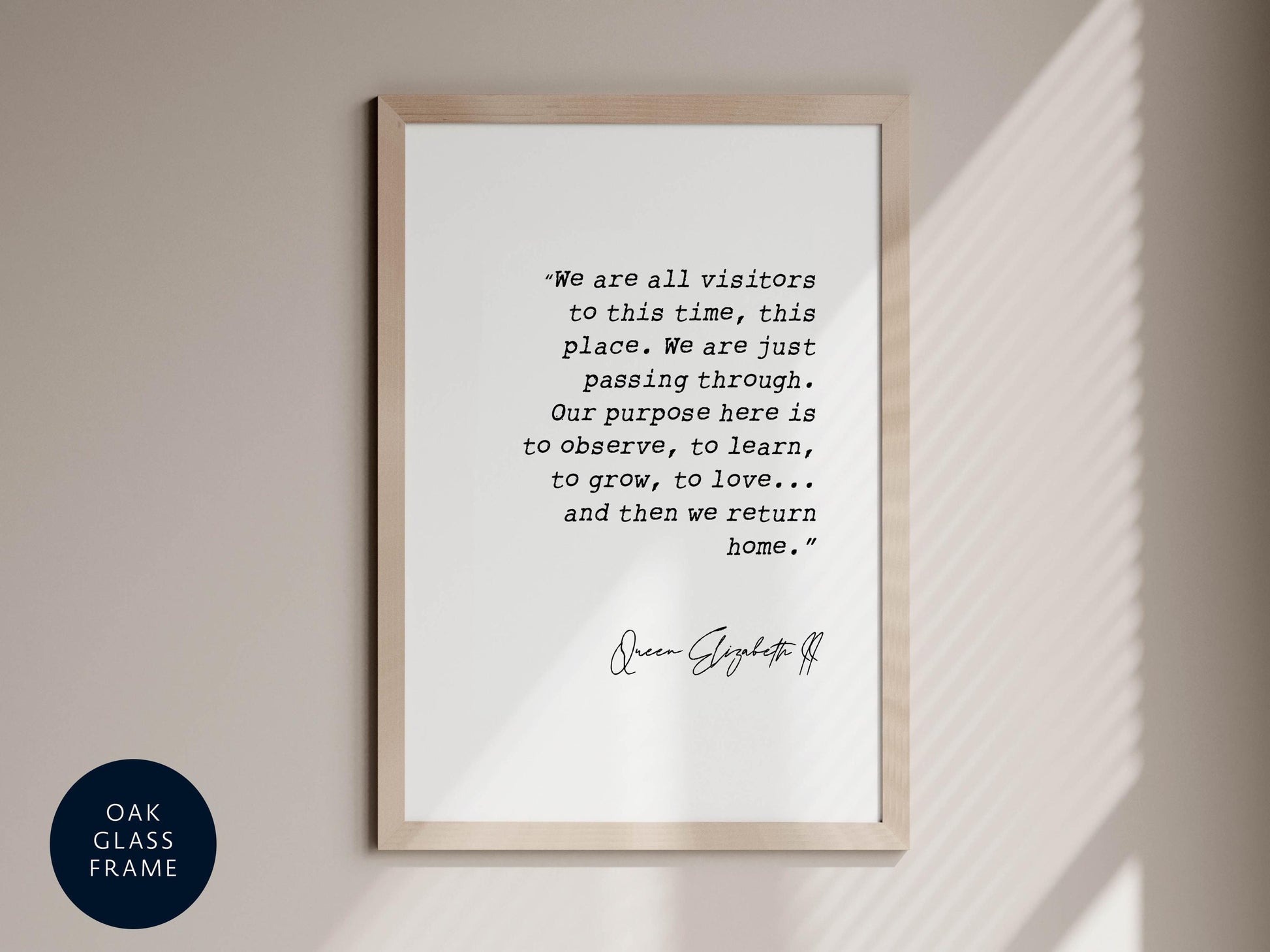 a framed quote by Queen Elizabeth II, which reads: &quot;We are all visitors to this time, this place. We are just passing through. Our purpose here is to observe, to learn, to grow, to love... and then we return home.&quot;