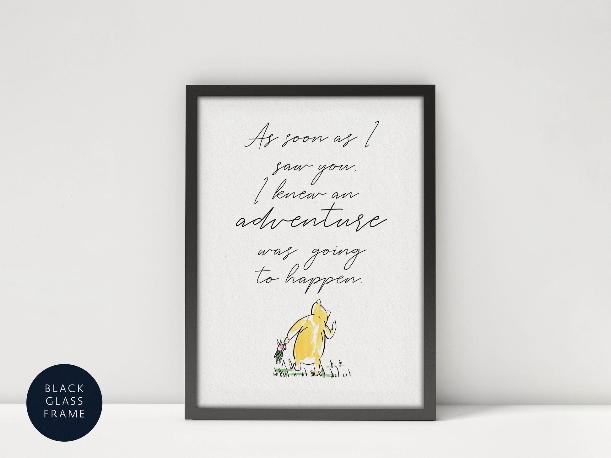a framed quote with a yellow character, likely Winnie the Pooh, in the background.