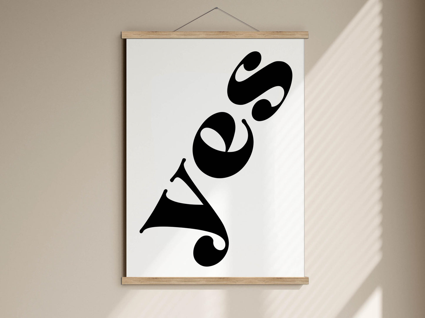 a large, bold, and stylized word &quot;YES&quot; in a black font, which is prominently displayed on a white background.