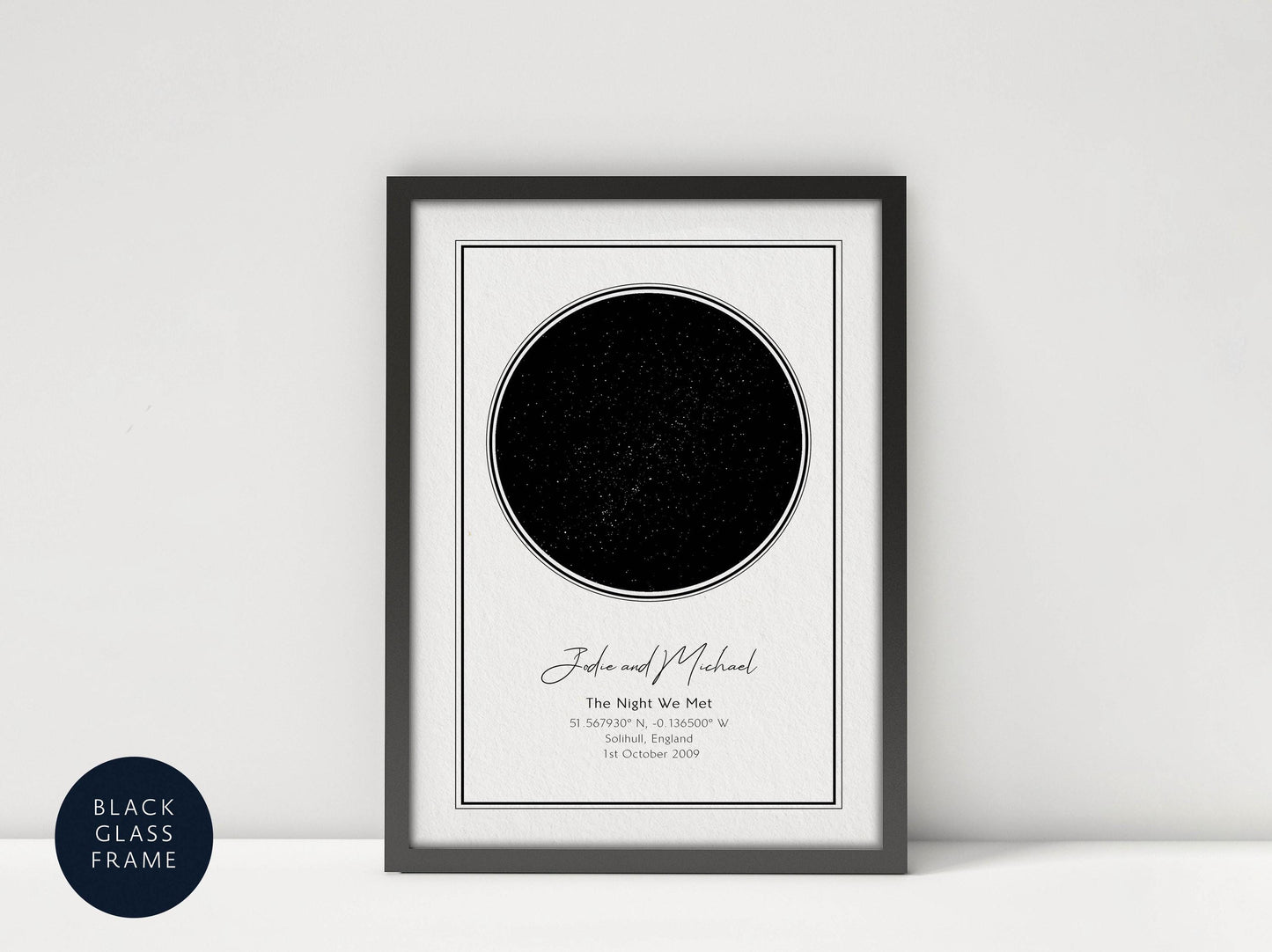 a framed artwork depicting a black circle with a starry background, accompanied by text providing information about the artwork.