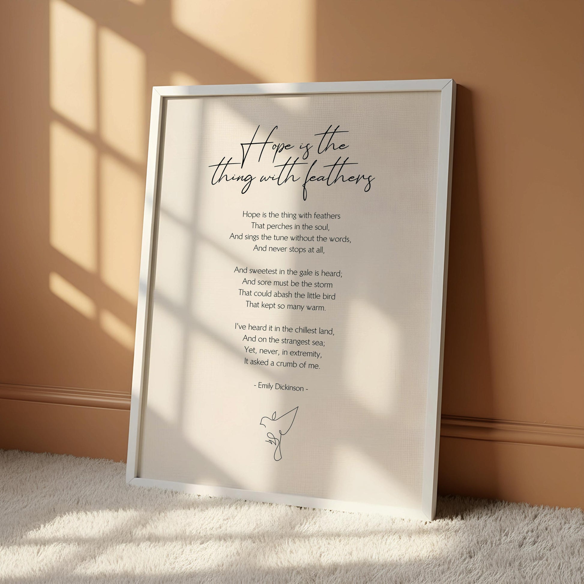 The image is a framed print of a poem titled "Hope is the thing with feathers" by Debbie Davidson.