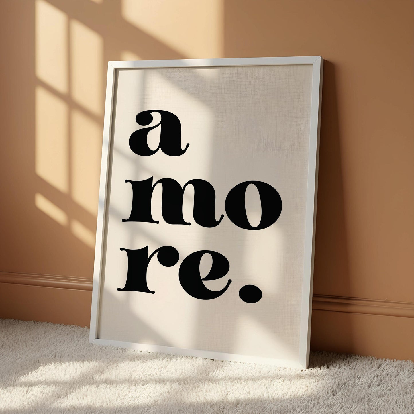 A white poster with the text "a more" in a bold, sans-serif font.