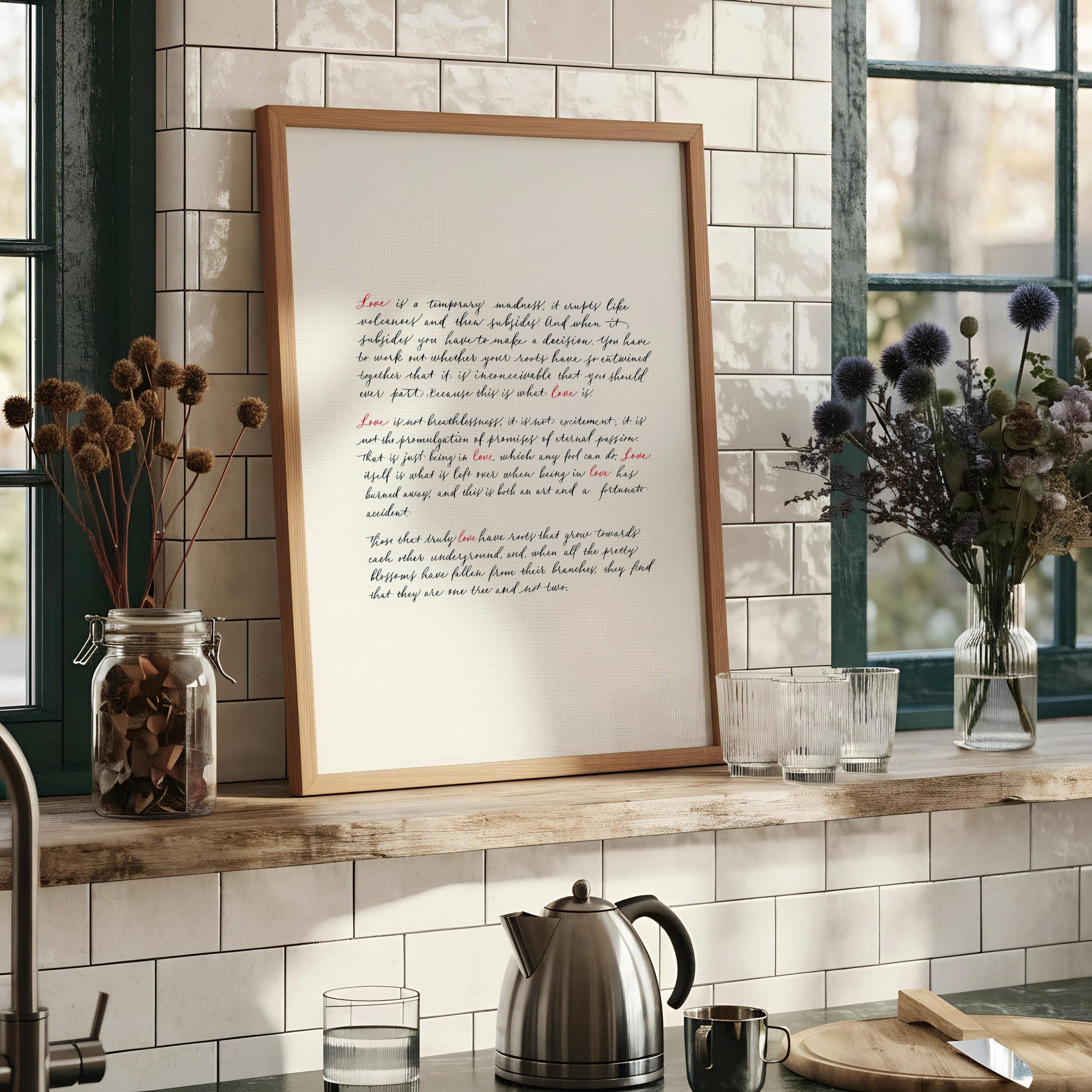 a framed print of a poem on a wall