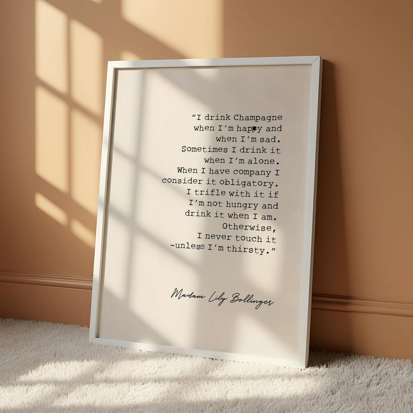 a quote by Lili Ballinger hanging on a wall.