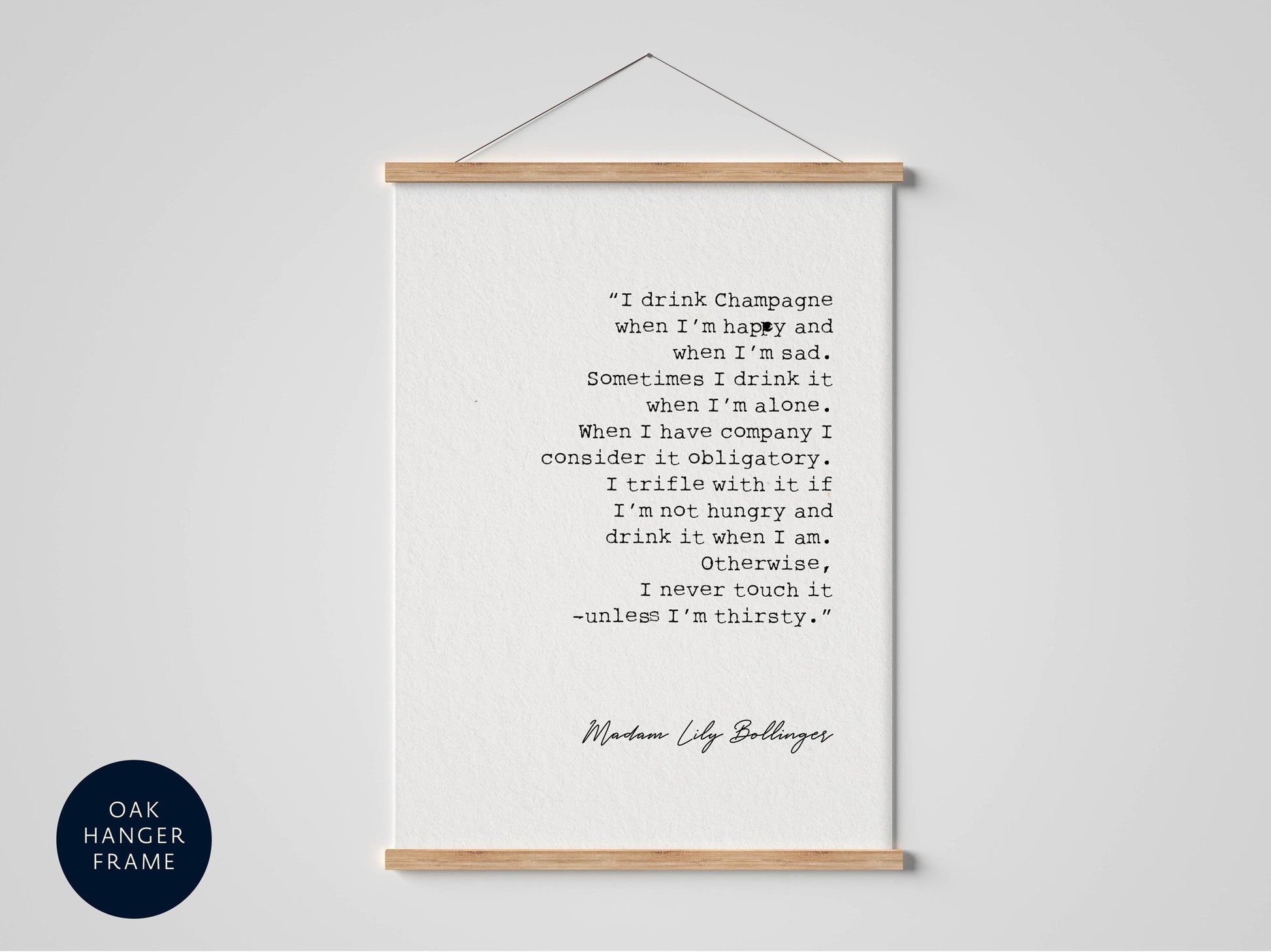 a framed quote by Maudie Lilly Bullinger, which reads: "I drink Champagne when I'm happy and sometimes I drink it when I'm sad. Sometimes I drink it when I'm alone. When I have company I consider it obligatory. I trifle with an 18-year-old. I'm not hungry and I drink it when I'm thirsty. I never drink it unless I'm thirsty."