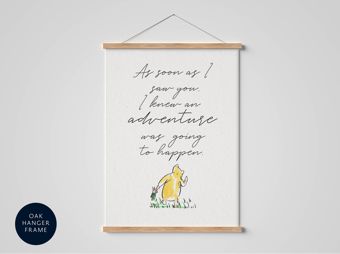 a framed quote with a yellow character, likely Winnie the Pooh, in the background.