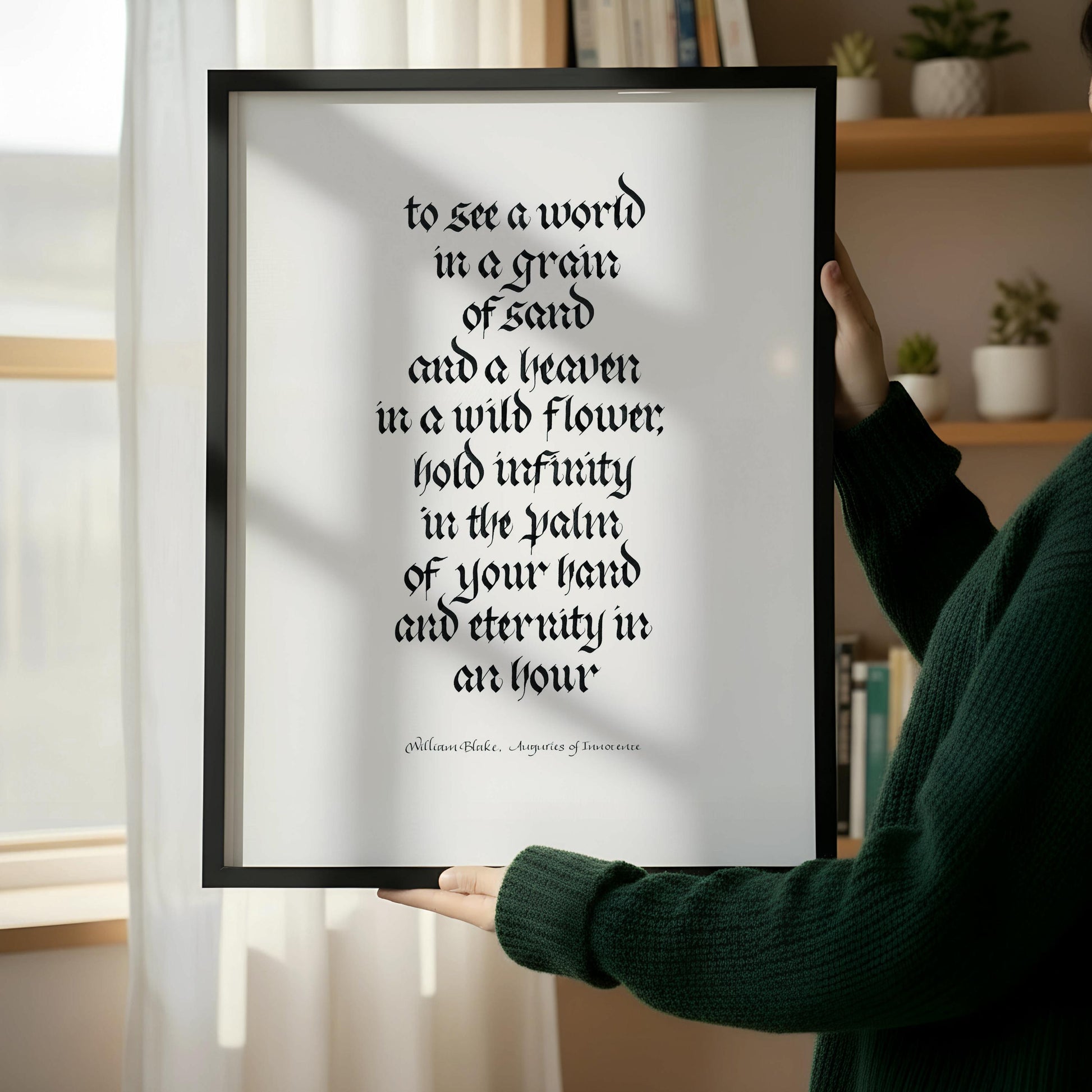 a wooden chair with a book resting on it, positioned next to a framed quote on a wall.