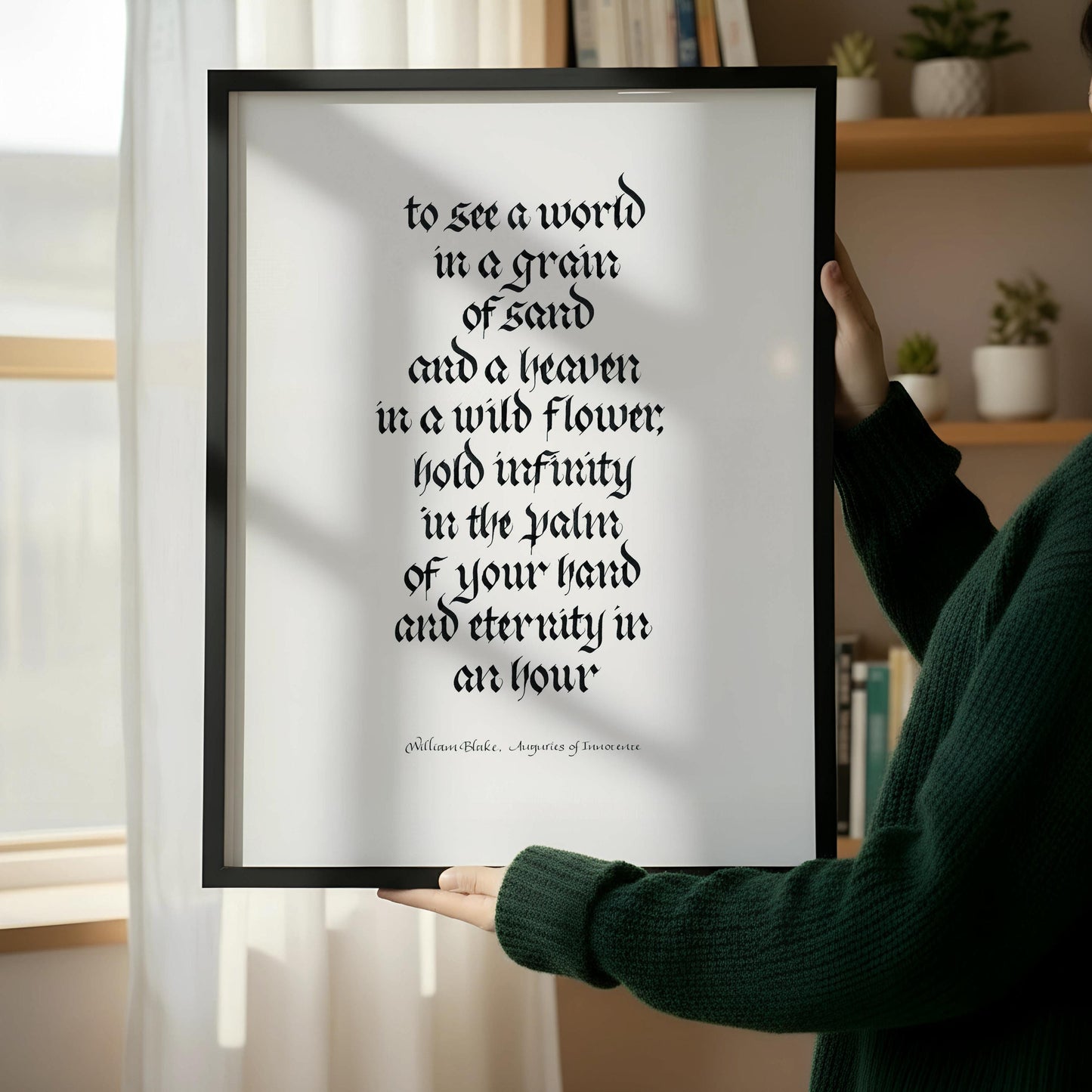 a wooden chair with a book resting on it, positioned next to a framed quote on a wall.