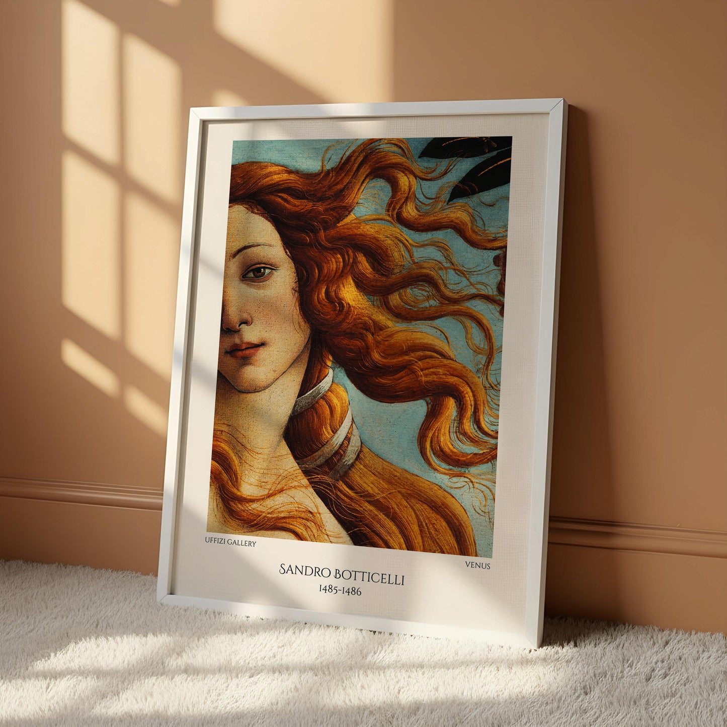 The image is a framed painting of a woman with flowing red hair, depicting the famous painting "The Birth of Venus" by Sandro Botticelli.