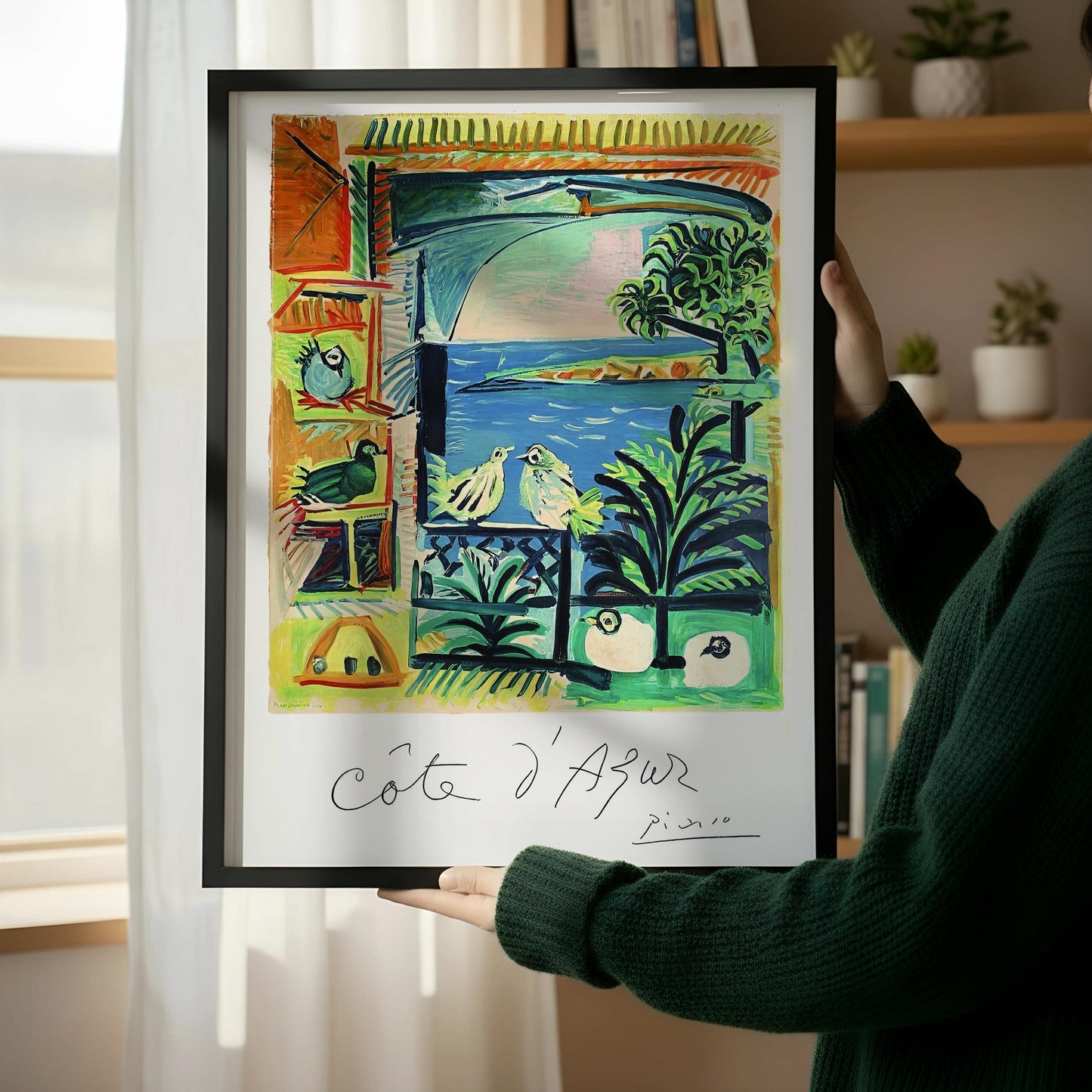 a wooden chair with a book resting on it, positioned next to a framed painting on a wall.