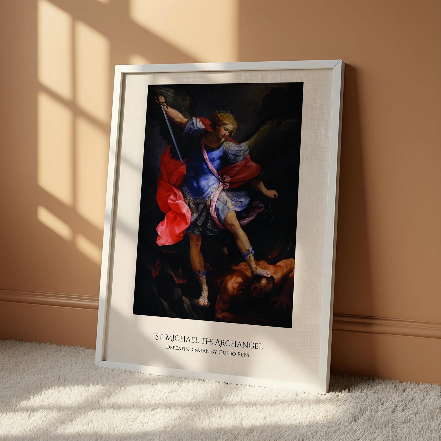 The image is a framed painting of St. Michael, the archangel, standing on a pedestal and holding a sword, with a winged figure below him.