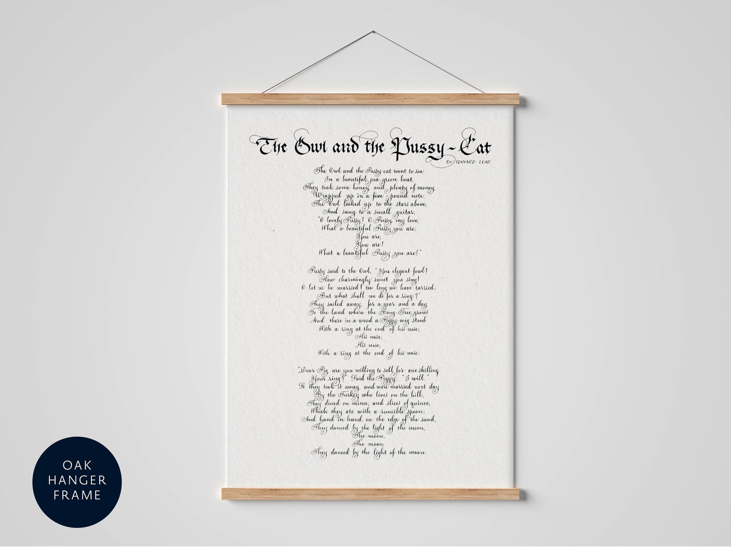 a framed print with a poem titled "The Owl and the Pussy Cat" in a black and white style.