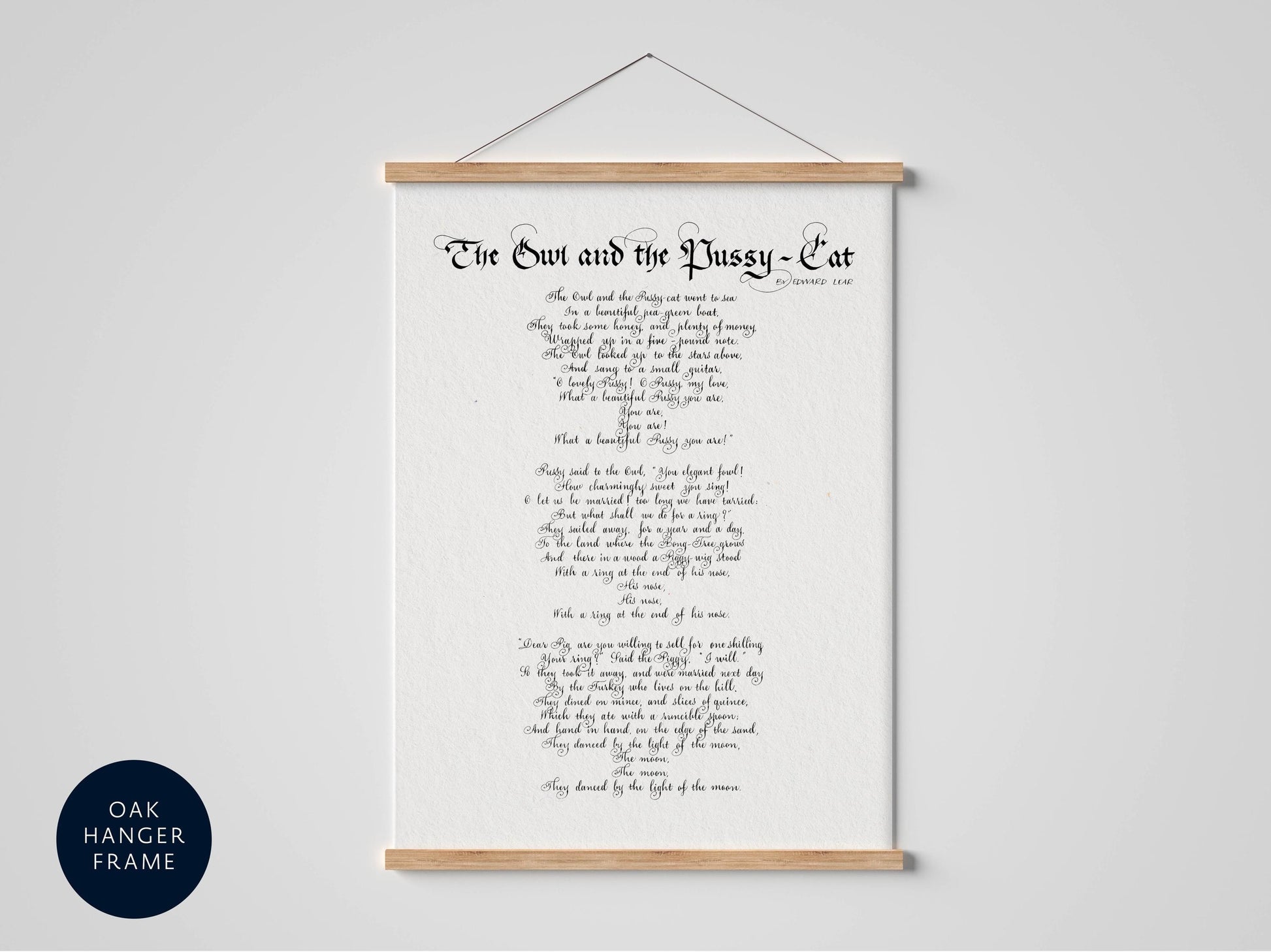 a framed print with a poem titled "The Owl and the Pussy Cat" in a black and white style.