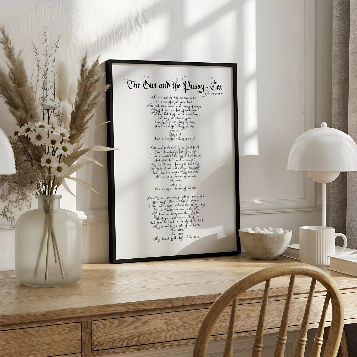 The image is a framed print of a poem titled "The Owl and the Pussy-Cat" by Robert Louis Stevenson.