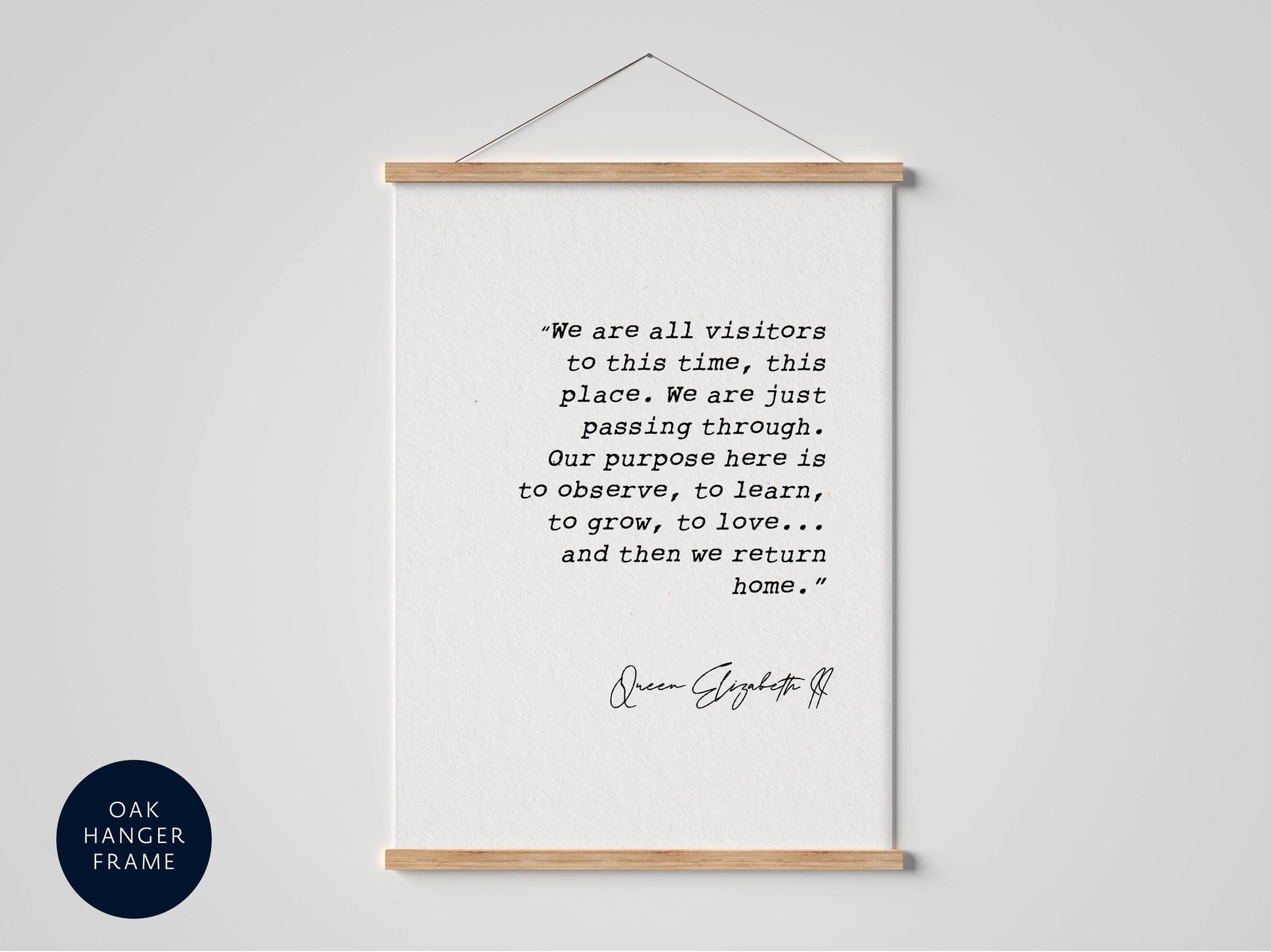 a framed quote by Queen Elizabeth II, which reads: "We are all visitors to this time, this place. We are just passing through. Our purpose here is to observe, to learn, to grow, to love, to return home."