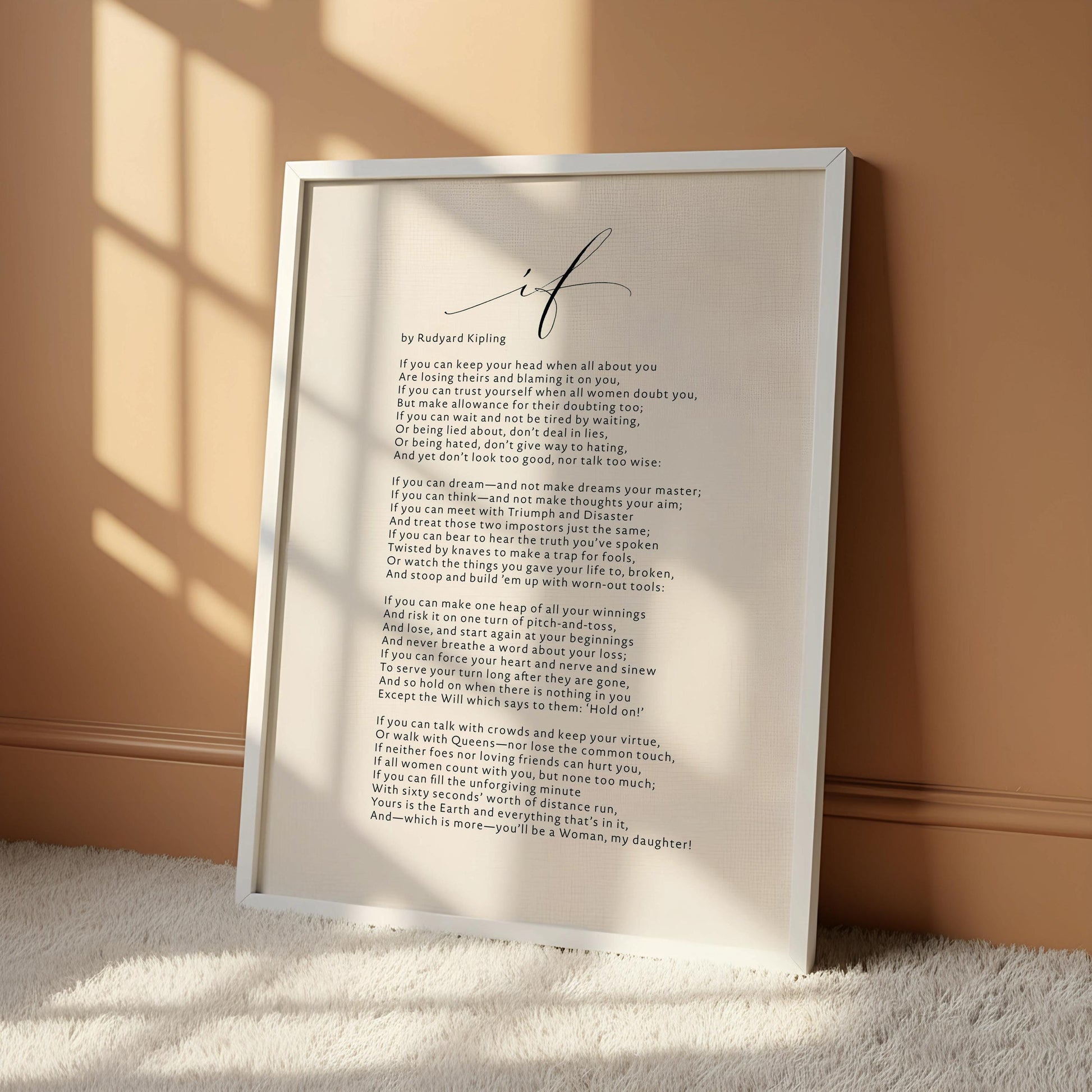 The image is a framed print of a poem titled "If" by Rudyard Kipling, which is hanging on a wall.