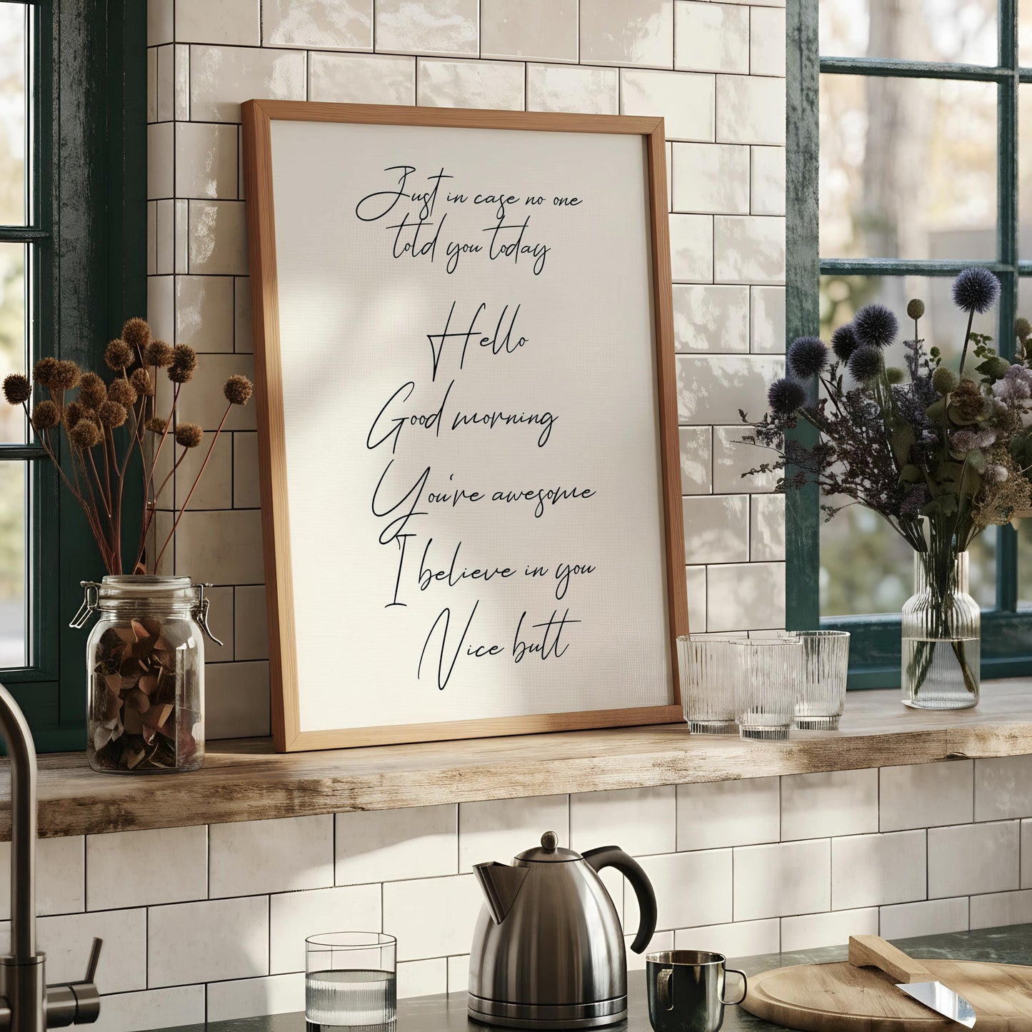 a framed piece of art with a motivational message written in a cursive font. The message reads: "Just in case you said today, Hello God morning, You're awesome, I believe in you, Nice butt".