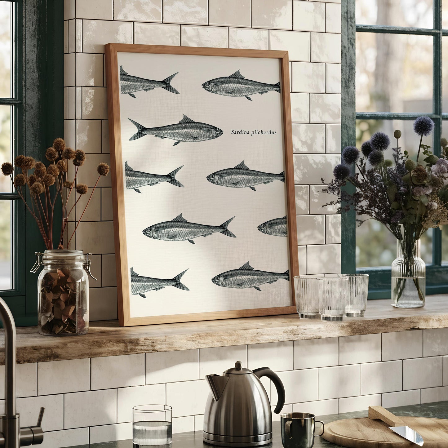 The image is a framed print featuring a repeating pattern of fish illustrations, with the text "Sardina piscidae" written below each fish.