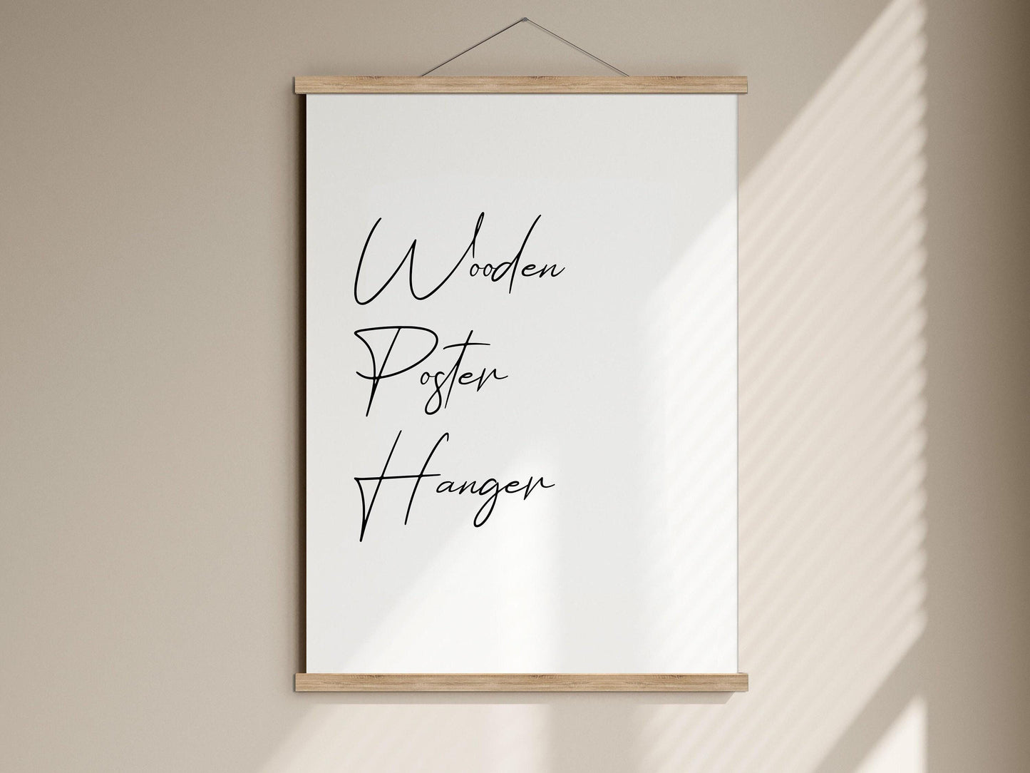 A white poster with the words "Wooden Posters Hangen" written on it, hanging on a wall.