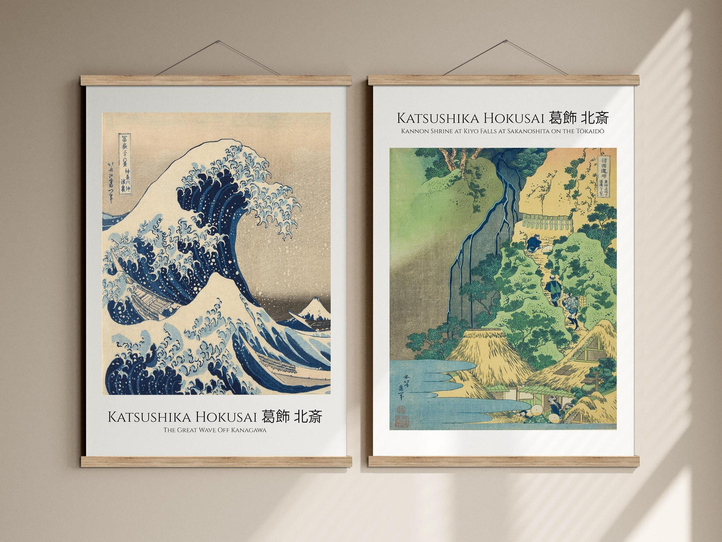two framed prints of the famous Japanese woodblock print "Katsushika Hokusai" by the renowned artist Hokusai. The prints depict the iconic woodblock print of the same name, showcasing the famous wave and landscape scenes.