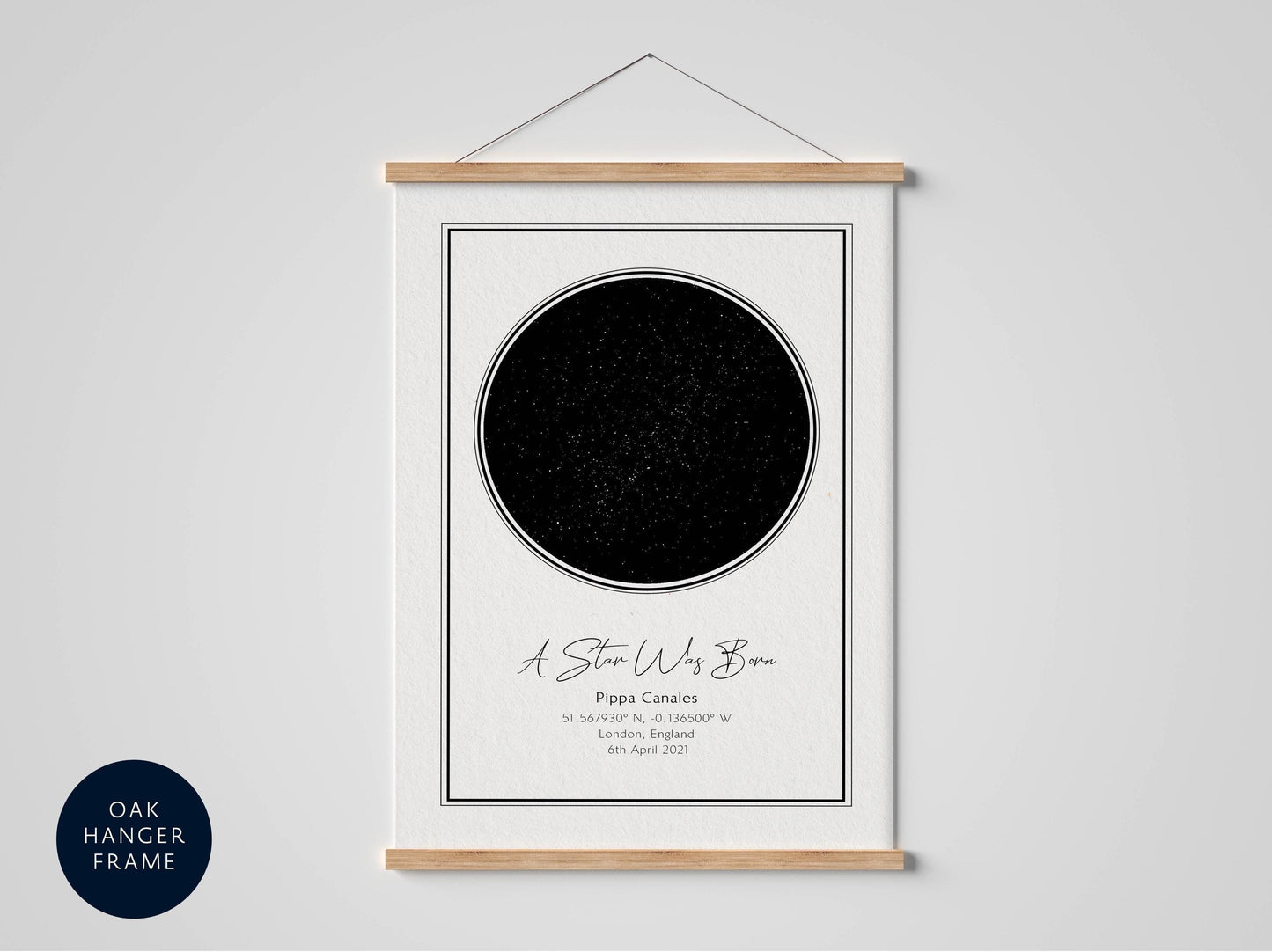 a framed artwork depicting a black circle with a starry background, accompanied by text providing information about the artwork.
