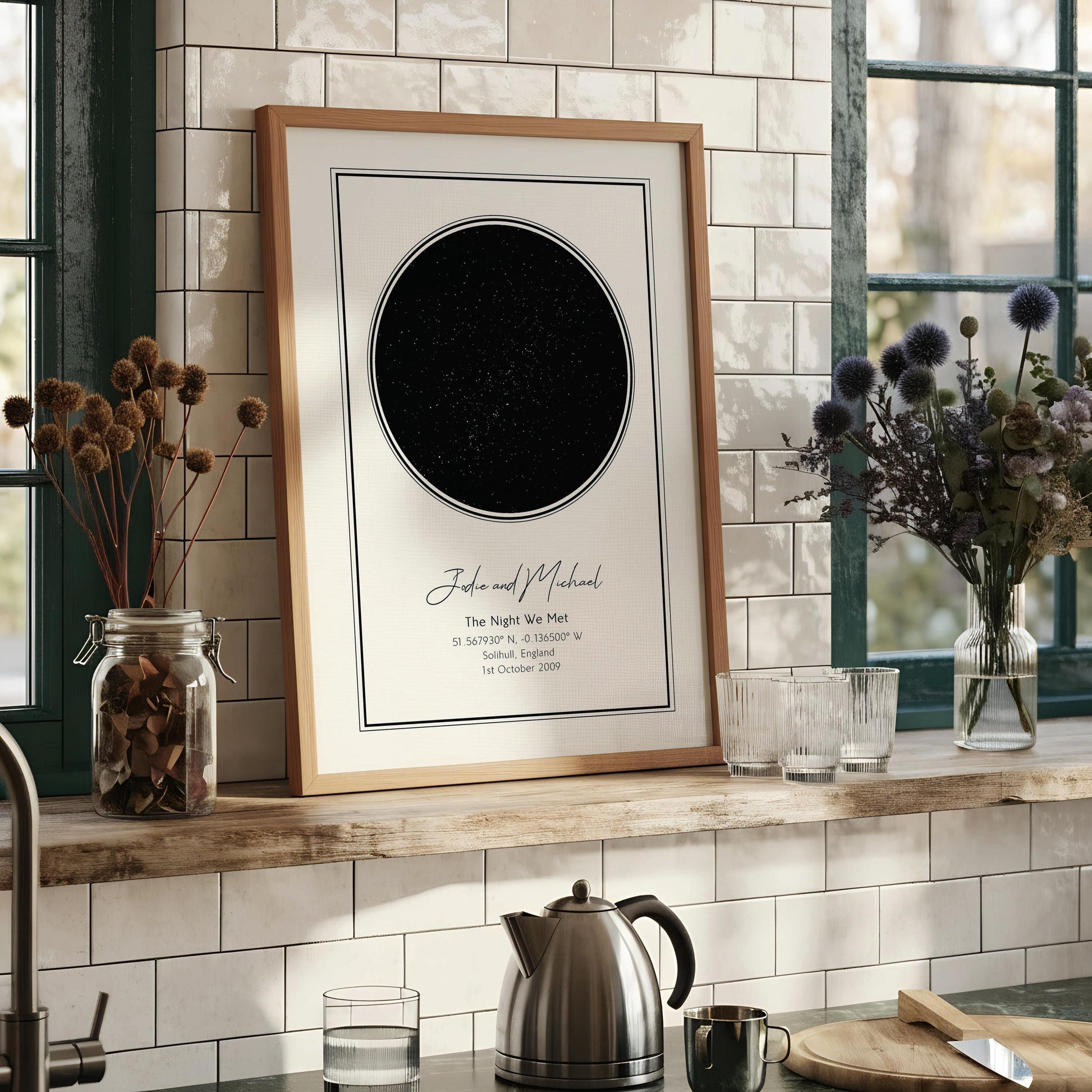 A framed print with a black starry sky design and text that reads "A Star Way Bione" and provides the location "51 565760, N, 141505 W, Llewis, Scotland, 6th April 2021".