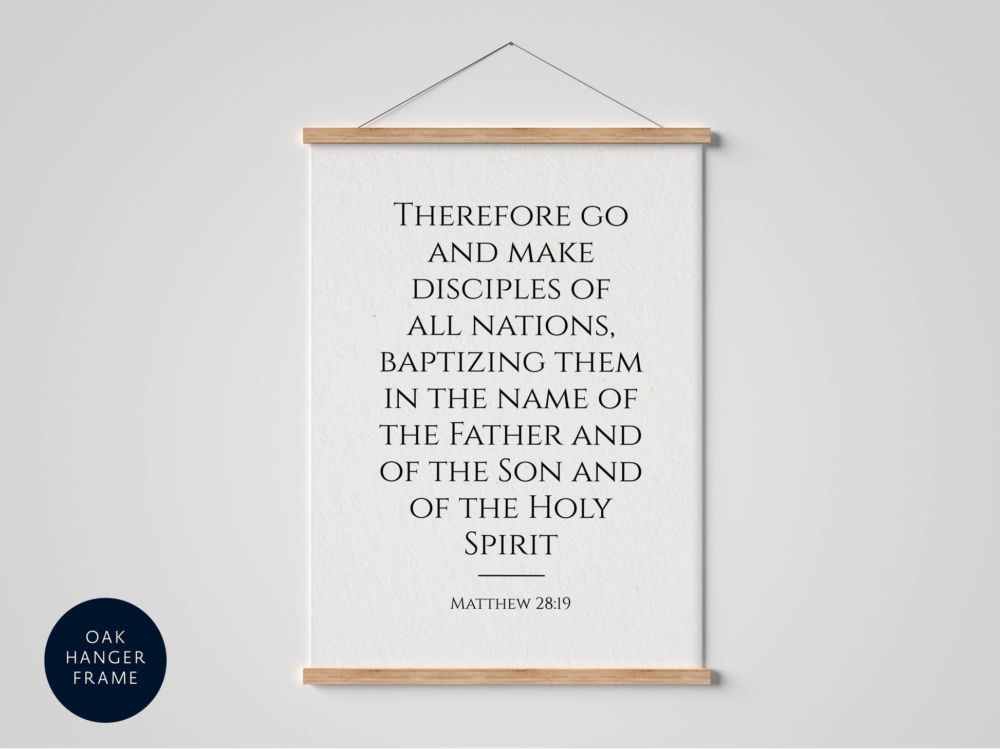 a framed quote from the Bible, specifically Matthew 28:19, which states "Therefore go and make disciples of all nations, baptizing them in the name of the Father and of the Son and of the Holy Spirit".