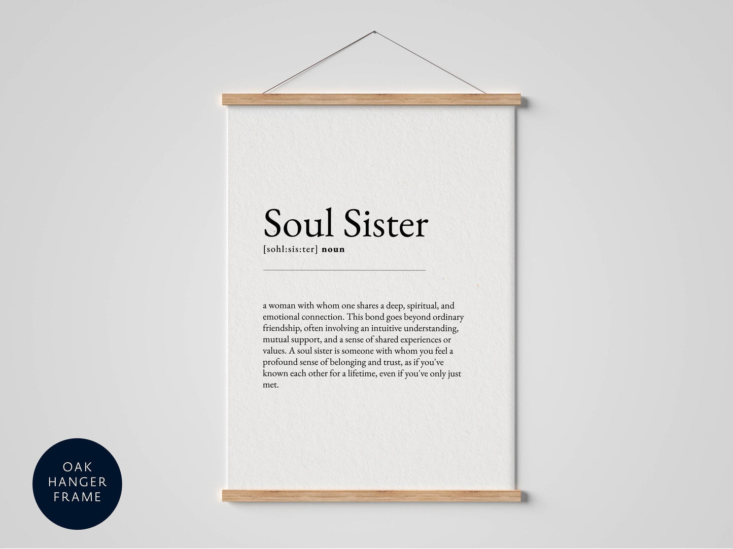 a black framed poster with a definition of a "Soul Sister" in white text.