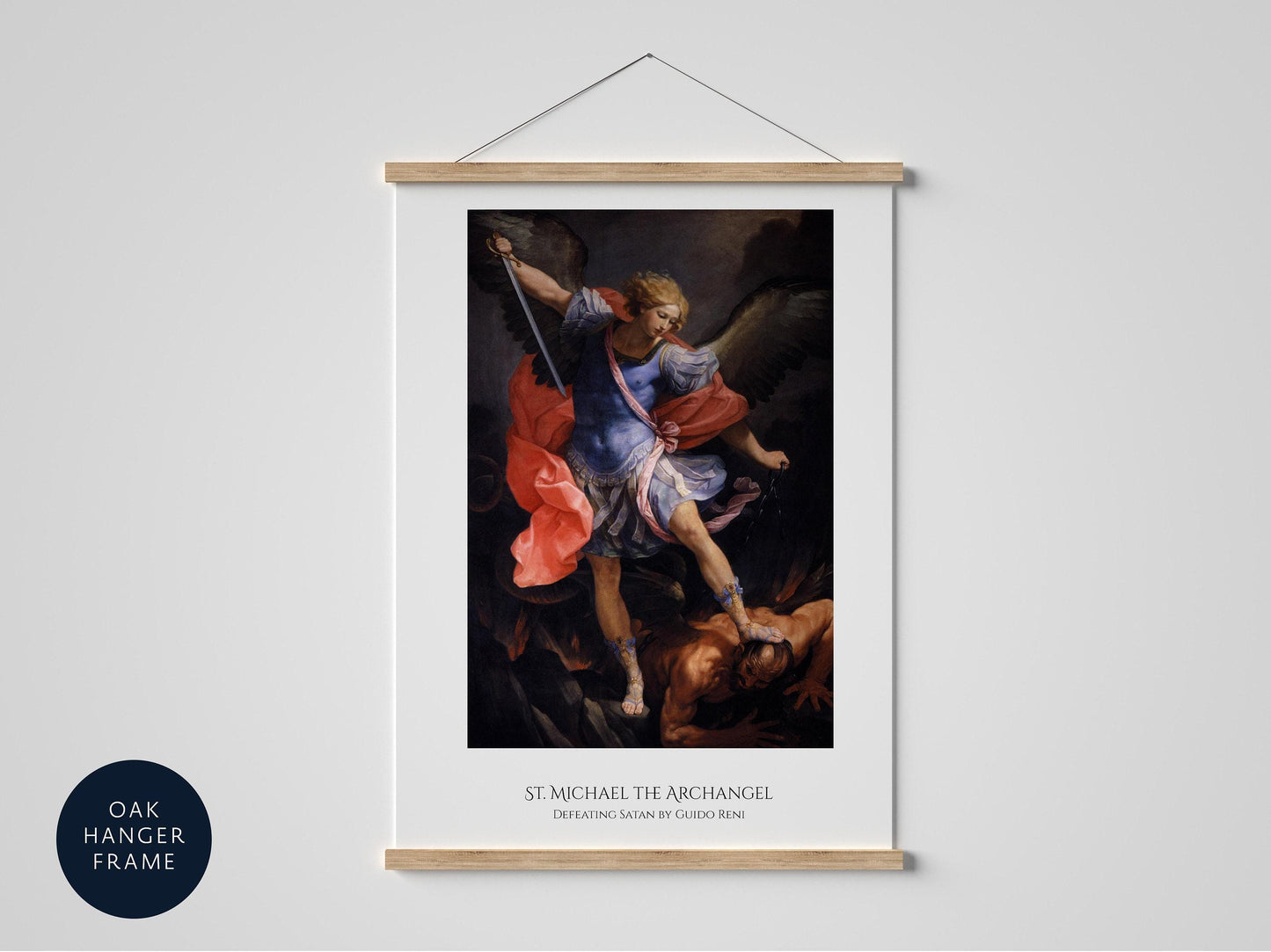 The image is a framed painting of St. Michael the Archangel, depicted in a dramatic and powerful pose, with his arms raised and a sword in hand.