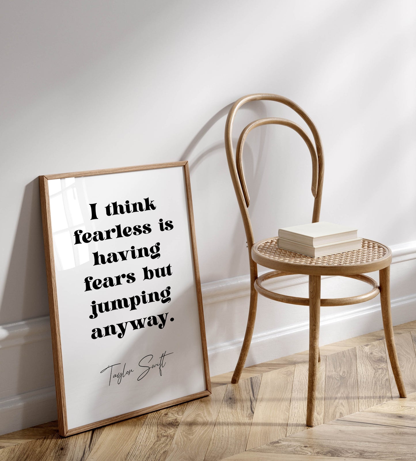 Taylor Swift quote - I think fearless is having fears but jumping anyway framed print