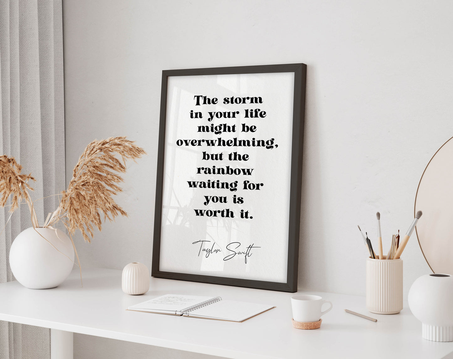 Taylor Swift quote - The storm in your life might be overwhelming, but the rainbow waiting for you is worth it framed print