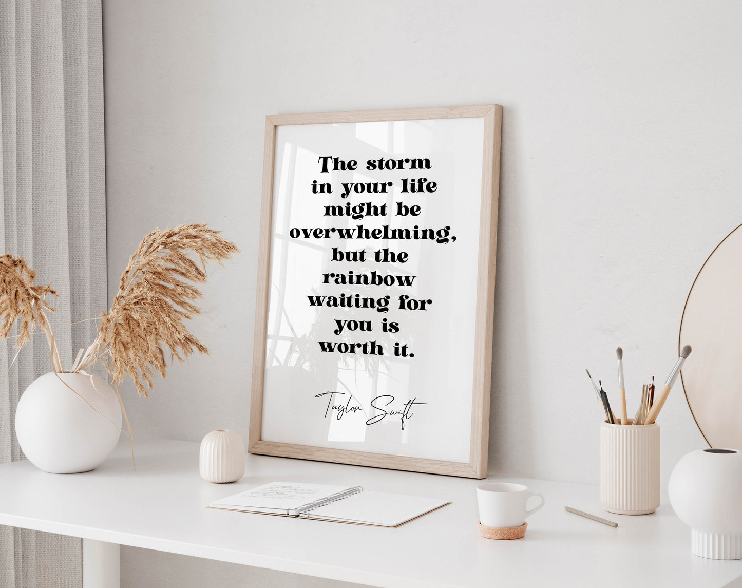 Taylor Swift quote - The storm in your life might be overwhelming, but the rainbow waiting for you is worth it framed print
